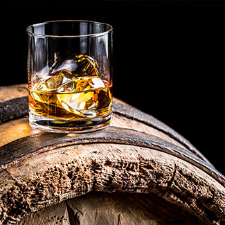 Whisky on barrel to celebrate the best Whiskies All Scotch Fans Must Try